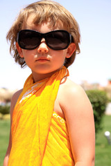 a little girl in big sunglasses © aglebocka