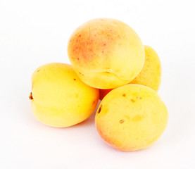 Apricots on a white background