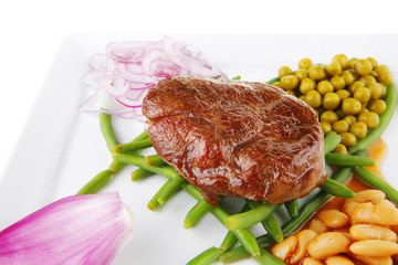 meat medalion on beans