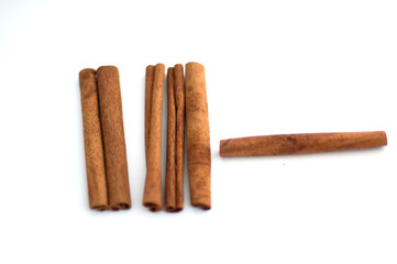 Cinnamon sticks on a white background
