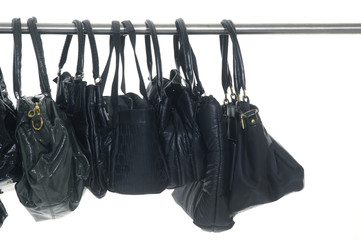 Black fashion handbags hanging