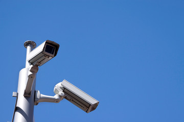 CCTV against a blue sky