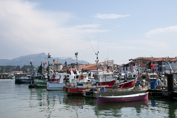 Fototapeta na wymiar Boats parking in a little harbor
