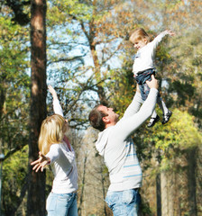 happy family in autumn park