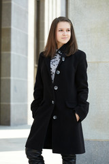 beautiful young girl near library