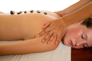 shoulder massage with stone-massaggio a spalle con pietre