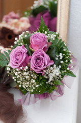 Wedding bouquet made from roses and gypsophila
