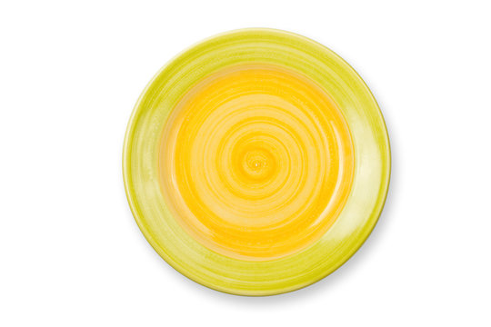 Round yellow plate isolated on white background