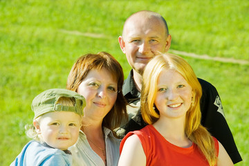 Fototapeta premium Happy family from four