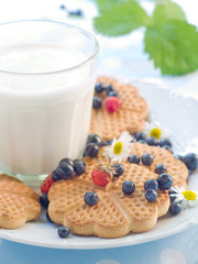 Glass of milk with cookies