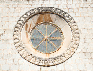Fototapeta na wymiar Beautiful historical window in Mediterranean style