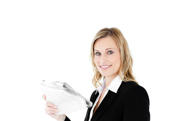 Businesswoman reading newspaper