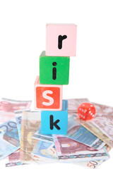 euro risk in toy play block letters