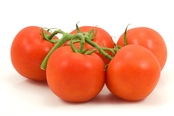 bunch of fresh tomatoes on white background