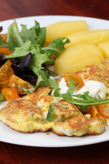 Zucchini omelet with eggs and blue cheese