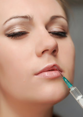 Injection on lips of a young girl