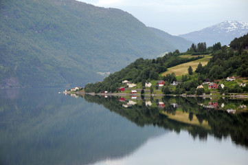 Fototapeta premium Reflections in Nordfjord from Loen