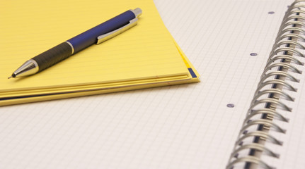 Mechanical pencil on a notepad