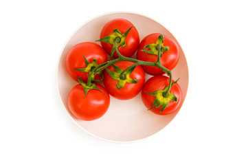 Red tomatoes isolated on the white background