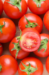 Red tomatoes arranged at the market stand