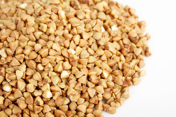 Buckwheat seeds closeup isolated on white