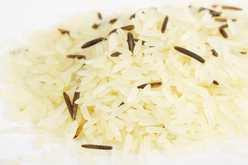 Closeup of long rice mixed with wild rice isolated on white
