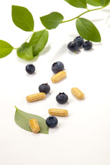 Bilberry pills and berries