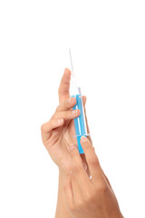 Syringe in a hand