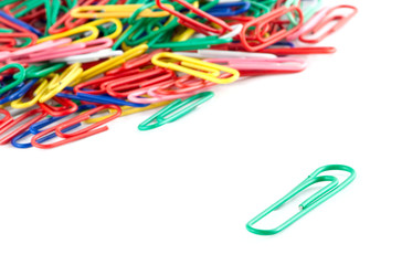 Colorful paper clips on white background