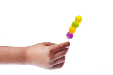 Jelly lollipop in the child hand