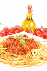Colorful spaghetti bolognese,fresh tomatoes and olive oil