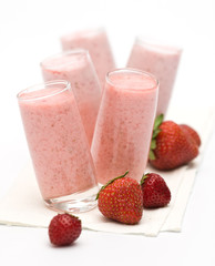 Strawberry smoothie on white background