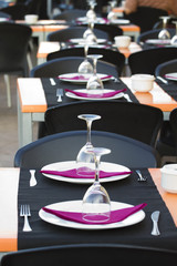 Outdoor restaurant in Denia, Spain. A table set.