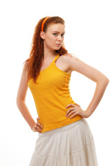 redhead girl poses in the studio