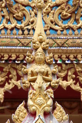 Fototapeta na wymiar art on gable, Wat Nongnaewararam, Kud Rang, Mahasarakam