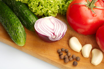 Fresh vegetables on wooden hardboard