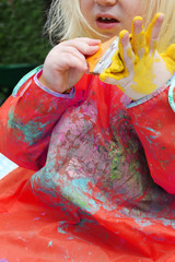 Fototapeta premium child painting hands