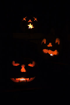 Three scary jack o'lanterns vertical
