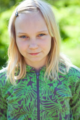 Fototapeta premium Portrait of a girl in summer