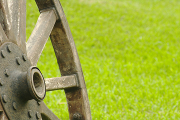 Old wooden wheel standing (Selective Focus)