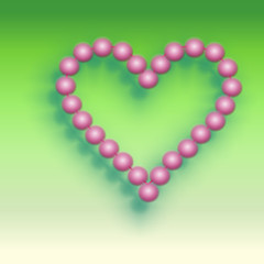 rosa Herz auf grünem Hintergrund