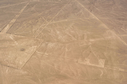 Mysterious Nazca lines on the desert, top view