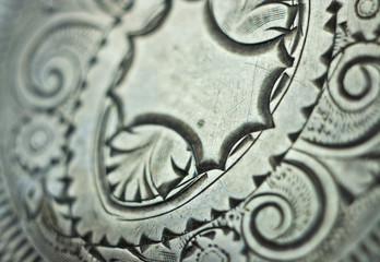 Antique silver engraving colorful background.