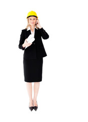 Assertive female architecture talking on phone wearing a hat