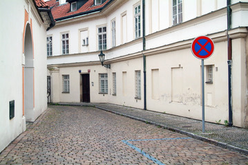 Narrow alley between tenement houses in Prague.