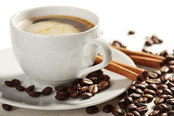 cup of coffee and roasted beans isolated