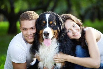 Portrait of couple with dog