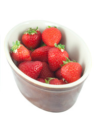 strawberries in bowl isolated on white