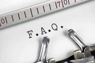 Typewriter macro closeup, typing FAQ, frequently asked questions F.A.Q. concept