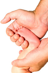 leg of the child in father's hand